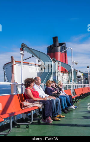 Isola di Arran auto servizio di traghetto e passeggeri Foto Stock