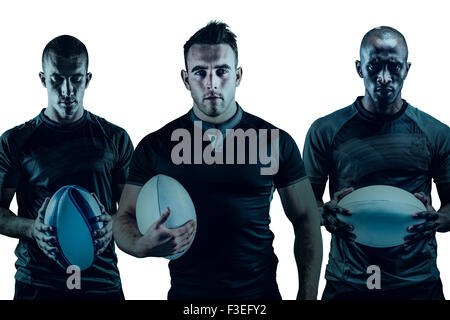 Gruppo di agguerriti giocatori di rugby Foto Stock