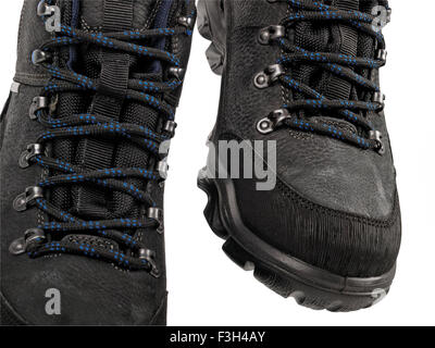 Nero Stivali sportivi isolati su sfondo bianco Foto Stock
