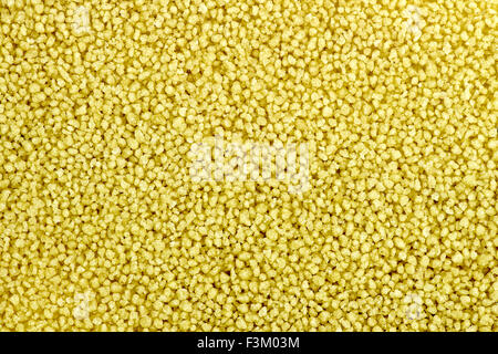 Sfondo Macro closeup di materie di couscous crudo Foto Stock