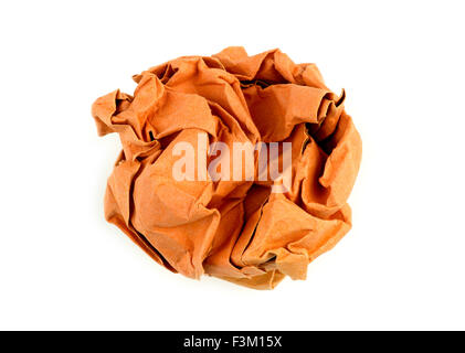 Crumpled palla di arancione carta recylced Foto Stock