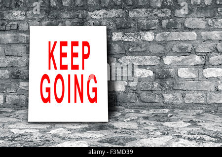 Continuate segno sul piano interno nero Foto Stock