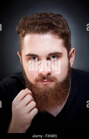 Ritratto di una Teenage hipster con la barba Foto Stock