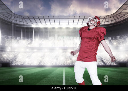 Immagine composita di un trionfo di un giocatore di football americano Foto Stock