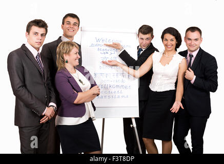 Il team di business nei pressi di lavagna a fogli mobili Foto Stock