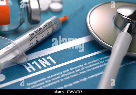 H1N1. Concetto medico su sfondo blu. Foto Stock