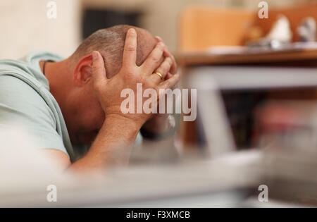 Egli ha perso tutti i suoi lavori Foto Stock