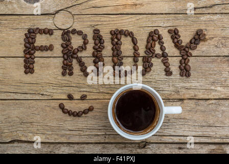 Tazza di caffè su sfondo di legno Foto Stock