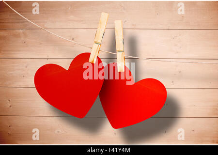 Immagine composita di cuori hanging on line Foto Stock