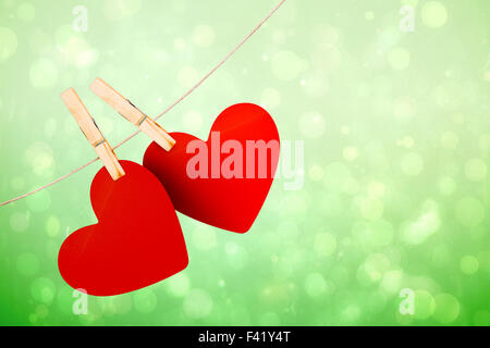 Immagine composita di cuori hanging on line Foto Stock