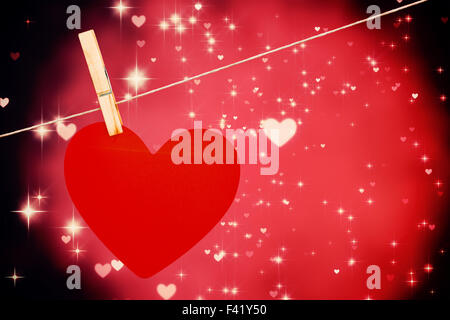 Immagine composita del cuore hanging on line Foto Stock