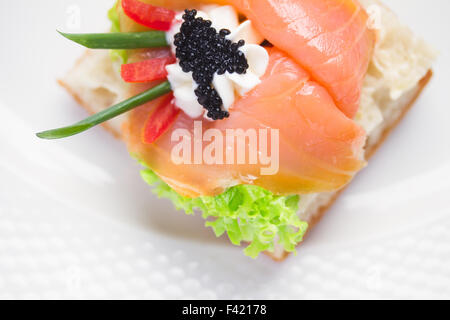 Sandwiche con salmone salato Foto Stock