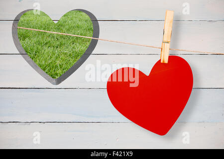 Immagine composita del cuore hanging on line Foto Stock