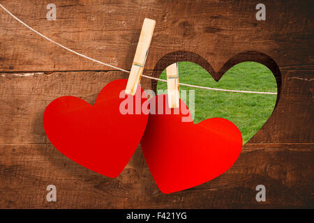 Immagine composita di cuori hanging on line Foto Stock