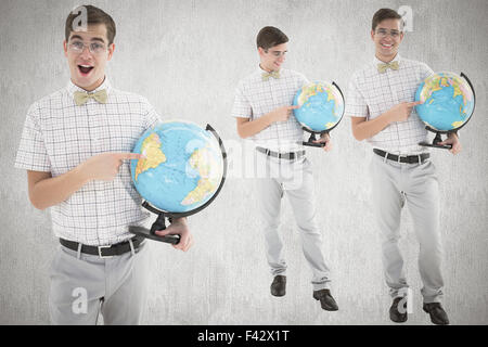 Immagine composita del nerd con globo Foto Stock