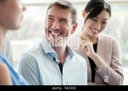 I soci dell'azienda l'incollaggio Foto Stock