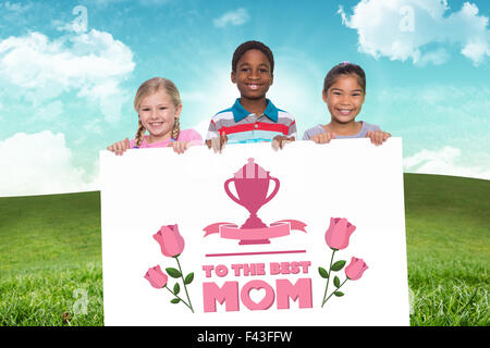 Immagine composita di alunni elementari sorridente Foto Stock