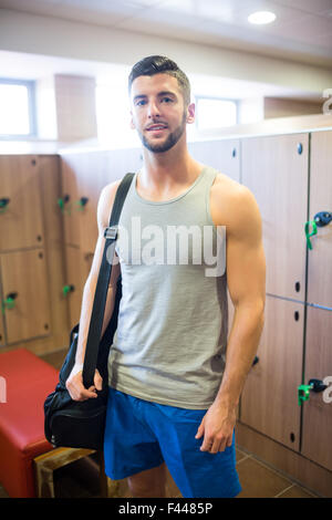 L'uomo sempre pronto a colpire la palestra Foto Stock