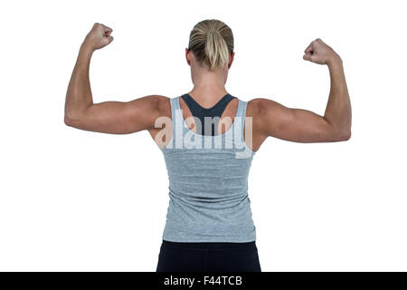 Vista posteriore della donna muscolare dei muscoli di flessione Foto Stock