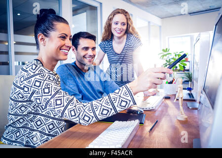 Felice designer che lavorano insieme Foto Stock