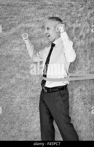 Immagine composita di imprenditore vincendo gara Foto Stock
