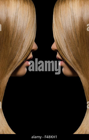 Profilo di due donne con capelli dritti Foto Stock