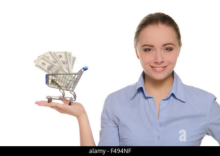 Donna con le fatture del dollaro nel carrello della spesa Foto Stock