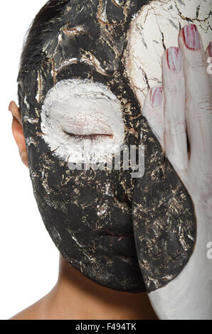 Yin-yang simbolo sul volto di donna asiatica Foto Stock