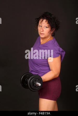 Boxer femmina in studio, con unione britannica bandiera per celebrare una vittoria, Settembre 2015 Foto Stock