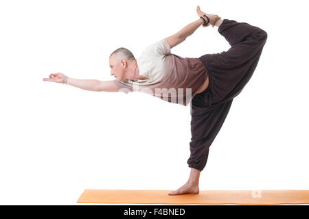 Immagine dell uomo in sports wear a praticare yoga Foto Stock