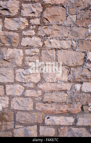Muro di pietra per la progettazione della tessitura o composite Foto Stock