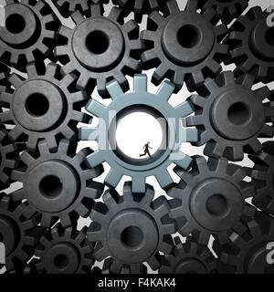 Imprenditore del moltiplicatore come concetto giant ingranaggi o ruote dentata all'interno di una rete di parti della macchina essendo mosso da una persona piccola come un concetto finanziario per il motore economico o oberati di lavoro essenziale per la produttività dei dipendenti. Foto Stock