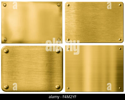 Oro piastre metalliche o cartelli insieme con i rivetti isolato Foto Stock