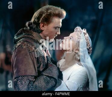 Laurence Harvey e Virginia Mayo / re Richard e i crociati / 1954 diretto da David Butler [Warner Bros Foto] Foto Stock