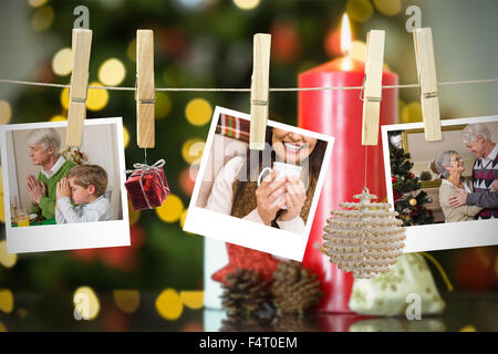 Immagine composita di Natale foto su una linea Foto Stock