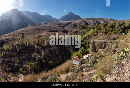 Spagna, Europa, Fataga, Gran Canaria Isole Canarie, Molina de Aqua, watermill, paesaggio, estate, montagne, colline, Foto Stock