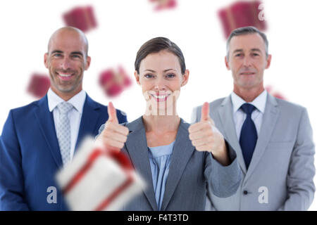 Immagine composita di colleghi d'affari sorridente in telecamera Foto Stock