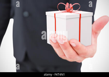 Immagine composita di imprenditore tenendo la mano Foto Stock