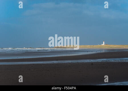 Sole che splende sul faro in Turnberry Foto Stock