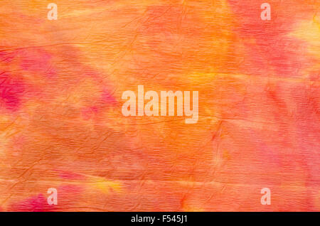 Orange pittura ad acquerello su carta crespa texture di sfondo Foto Stock