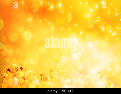 Vacanza astratto fondo oro con stelle forme e luci che si arrotonda Foto Stock