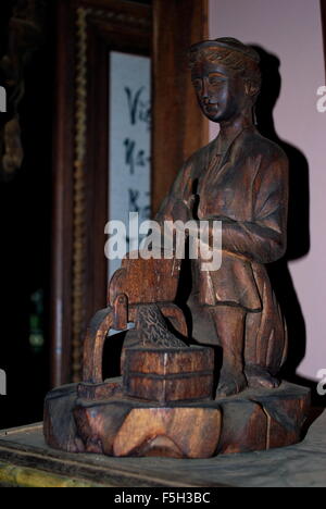 Medicina intagliato reliquia correlati, Ho Chi Minh City, Vietnam Asia Foto Stock