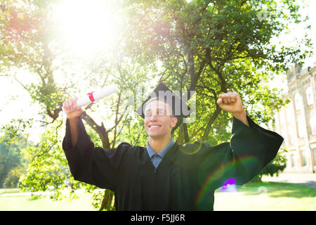 Concetto di studente il giorno di graduazione Foto Stock