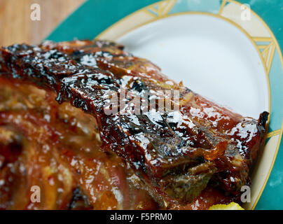 Spicy costolette di maiale in salsa di arancio Foto Stock