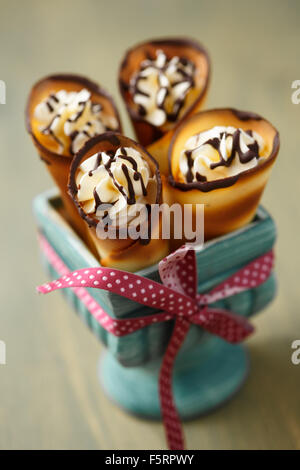 Il Brandy cono con ripieno cremoso Foto Stock