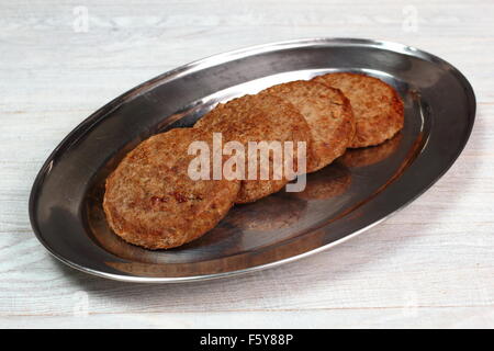 Fritte Burger polpetta di carne di manzo Foto Stock