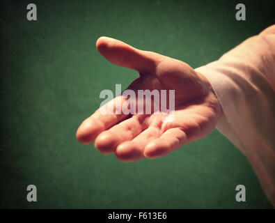 La mano di Dio raggiungendo fuori Foto Stock