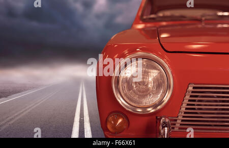 Red Classic car su asfalto Foto Stock