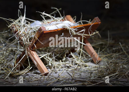 Mangiatoia nella stalla astratto simbolo di natale closeup Foto Stock