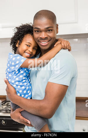 Padre e figlia in cucina Foto Stock